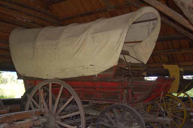 covered wagon on display at Menor's Ferry